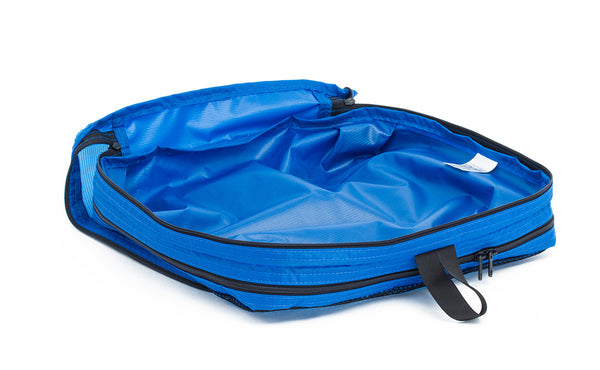 An empty and open Island (blue) Aether Large Aeronaut 30 Packing Cube showing the all-fabric side.